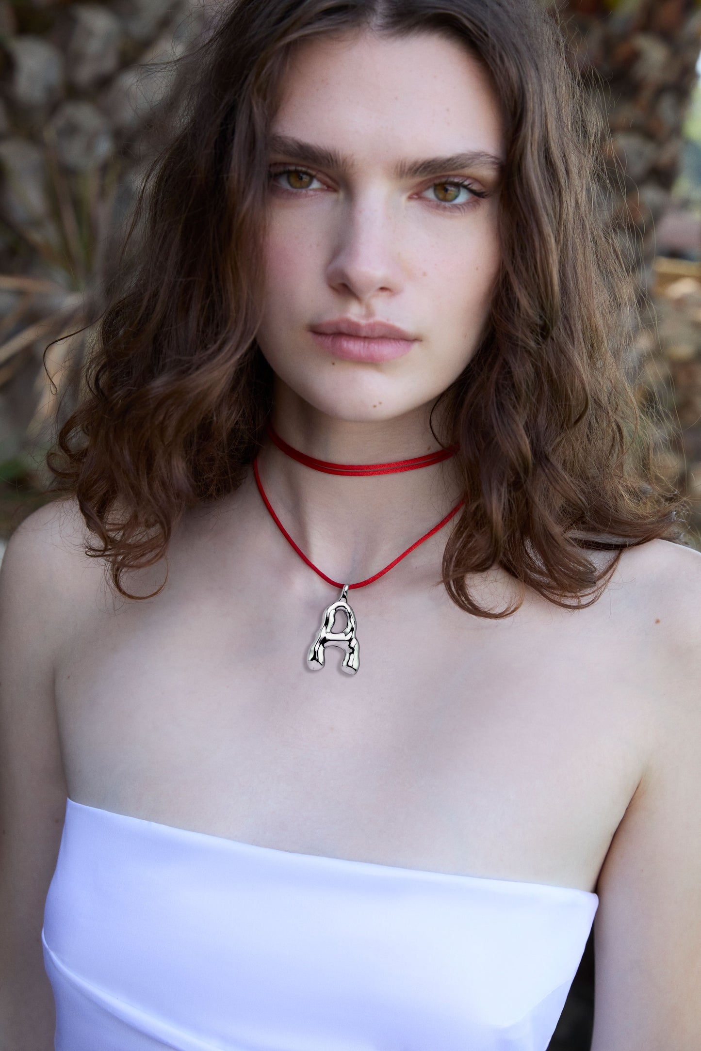 Rebel Alphabet Letter in 925k Sterling Silver with Silk Cord